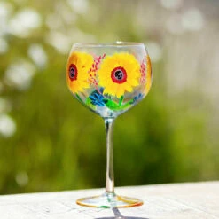 Lynsey Johnstone Hand Painted Sunflowers & Blue Wildflowers Gin Glass -Campus Gifts Sales lesser pavey lp49746 lynsey johnstone sunflowers blue wildflowers gin glass lifestyle